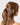 Model wearing Eco-Friendly Nylon Elastics 20pc - Eucalyptus in a ponytail hairstyle.