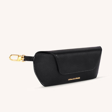 Olivia Eyewear Case in premium vegan leather with gold-tone hardware and wristlet attachment.
