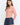 Pearl Button Ribbed Knit Cardigan in pink side view on a model