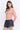 Pearl Button Ribbed Knit Cardigan in pink side view on a model