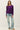 Full-length view of model wearing purple Ultra Soft Boatneck Basic Long Sleeve Top with blue jeans