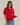 Model wearing red short sleeve sweater cardigan