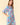 Floral Printed Split V-Neck Half Bell Sleeve Dress showcased on a model with floral designs and ruffle details.