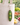 Felt Smiling Veggie Keychain - Peas in a Pod attached to a beige tote bag in a vibrant garden setting.