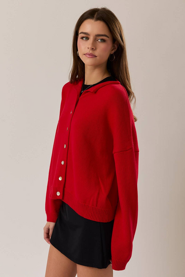 Side view of model wearing red Round Rolled Hemline Detail Thin Sweater Cardigan with black shorts
