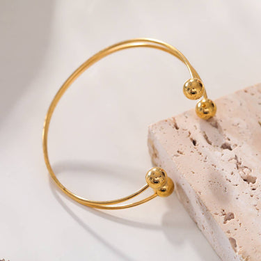 Front Opening Gold Bangle Bracelet with 2 Balls
