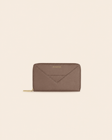 Mira & Moss Corrine Long Wallet in premium vegan leather with geometric silhouette and brushed gold-tone hardware.