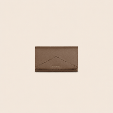 Mira & Moss Napa Long Wallet made of vegan leather with architectural V-line design and brushed gold-tone branding.