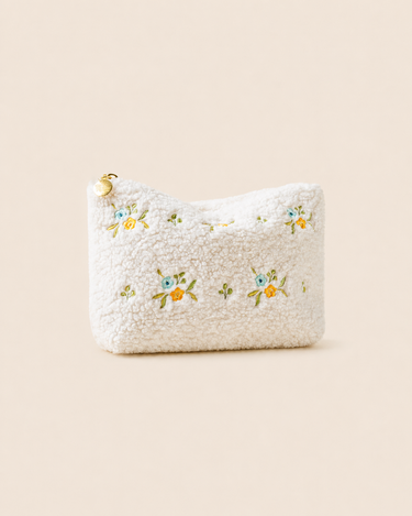 Teddy Pouch-Dainty Floral Blue + Yellow in cozy sherpa fabric with floral embroidery and gold hardware.