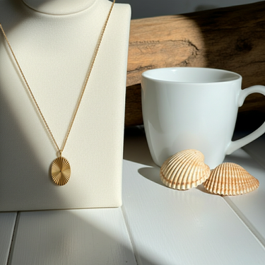 Jerod - Oval Sunburst Charm Necklace