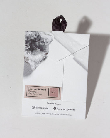 Gem in the Moon Gemstone Necklace- Tourmalinated Quartz packaging label showing gemstone details.