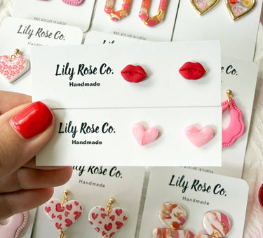 Mini Valentines Studs displayed on a white product card with assorted Valentine-themed designs