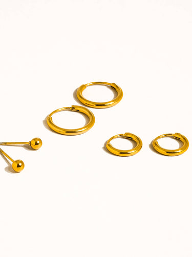 Brigitte 18K Gold Non-Tarnish Hoops Circle Earring set featuring three gold hoop earrings and a ball stud.