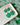 Four Leaf Clover Earrings Shamrock Earrings in green polymer clay on a white dish.