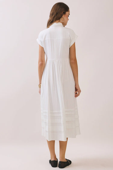 Back view of Classic Shirt Collar Neck Pleated Detail Dress highlighting pleated panel detailing.