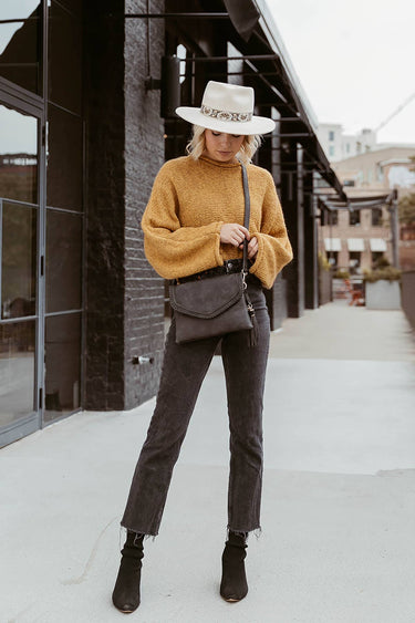 Sloane flapover crossbody bag with tassel