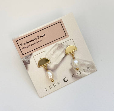 Ethereal Dainty Post Earrings featuring 14Kt gold plated brass and cultured freshwater pearls on a display card.