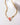 Prism Gems Birthstone Necklace - October featuring a pink Peruvian opal and geometric link chain.