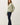 Model wearing garment-washed cotton modal fleece sweatshirt, side view