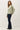 Model wearing garment-washed cotton modal fleece sweatshirt, side view