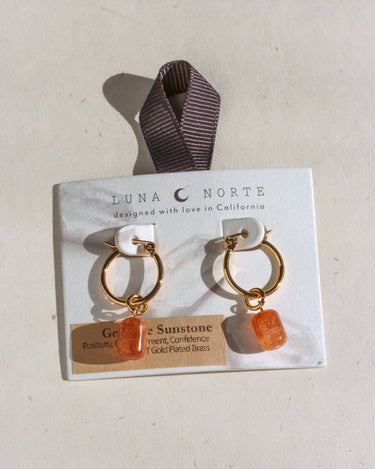 Pill Drop Hoop Earrings- Sunstone displayed on card, featuring gold hoops and genuine sunstone gemstones.