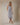 V NECK CAP SLEEVE BUTTON UP WAIST TIE BELT MIDI DRESS modeled by a woman wearing a size small.
