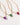 Prism Gems Birthstone Necklace - February featuring amethyst and elegant gold chain with pastel enamel stations.