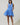Model wearing Kaidy Tropical Loly Trapeze Mini Dress in a full-length front view