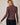 Back view of model wearing burgundy Mock Neck Long Sleeve Button Up Top