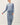 Model wearing blue long sleeve top with matching pants