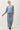Model wearing blue long sleeve top with matching pants