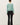Back view of model wearing purple [NEW COLOR] Ribbed Crewneck Cardigan in mint green.
