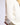 Close-up detail of Chiara white long-sleeve pullover sweater fabric