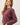 Front view of model wearing burgundy sweater