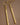 18K Gold Plated Waterproof Stainless Steel Drop Earrings 6976 displayed on a dark neutral background