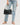 Waylon Shoulder Bag Chocolate in black displayed with a casual outfit.