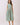Striped Smocked Waist Round Neck Midi Dress with a sleeveless design and side pockets.
