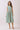 Striped Smocked Waist Round Neck Midi Dress with a sleeveless design and side pockets.