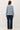 Back view of blue raglan sleeve slub pullover sweater on model
