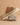 The Vista Camel Espadrille Platform Sandal on a rock backdrop, showcasing the espadrille detail and vegan leather upper.