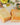 Sunset Dandelions Soap bars displayed with colorful flowers and botanical decorations