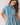 Blue Stripe Button Down Shirt Mini Dress featuring a classic collar, cinched waist, and side pockets on a model.