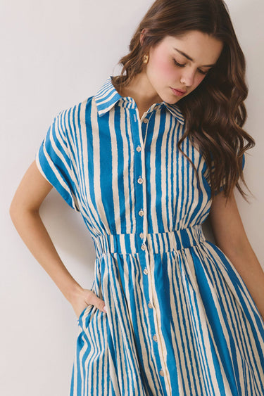 Blue Stripe Button Down Shirt Mini Dress featuring a classic collar, cinched waist, and side pockets on a model.