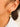 Dainty round stone dangle earrings close-up