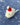 Mouse with Santa Hat Tufted Wool Christmas Ornament on snowy blue background