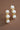 18K Gold PVD Plated Waterproof Stainless Steel Stud Earrings 7093 displayed vertically on a brown background
