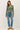 Full length view of model wearing purple [NEW COLOR] Ribbed Crewneck Cardigan in green