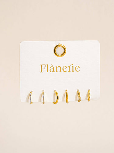 Claude 18K Gold Non-Tarnish CZ Hoops Earring set on display with card showing the brand Flânerie.