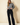 Round neck long-sleeve stripe sweater worn by a model, full length view