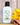 Sweater Weather Goat Milk Lotion bottle displayed with warm autumn-inspired decorative ingredients